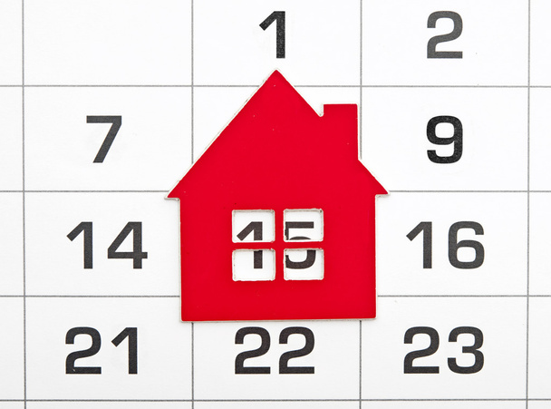 muoto punainen talo kalenterin taustalla
 - Valokuva, kuva