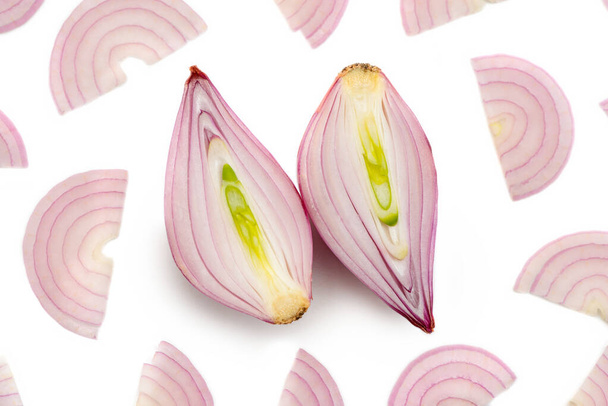 Halved shallot and red onion half moon slices on white - Фото, зображення