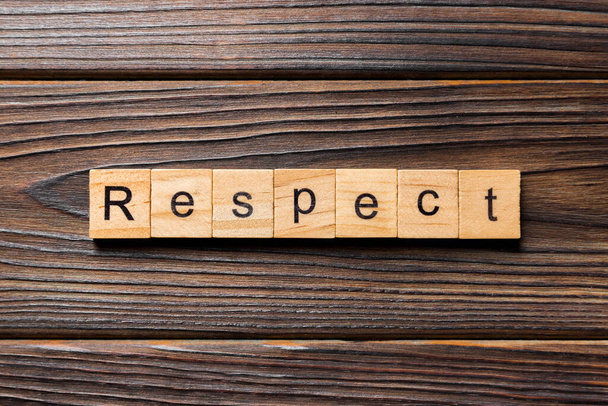 respect word written on wood block. respect text on table, concept. - Foto, Bild