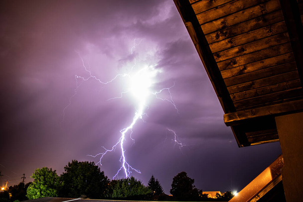 Lightning storm over a residential area - Photo, Image