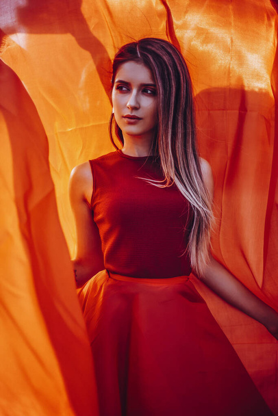 Beautiful woman with long red dress - Valokuva, kuva
