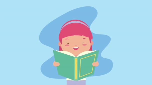 świat książki dzień świętowania z małą dziewczynką czytanie - Materiał filmowy, wideo