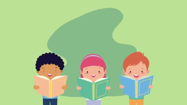 Küçük çocukların okuduğu dünya kitap günü kutlaması. - Video, Çekim