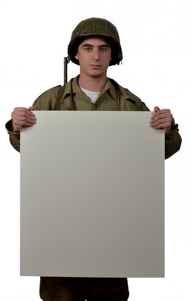genç Amerikalı askerin bir işareti gösterir - Fotoğraf, Görsel