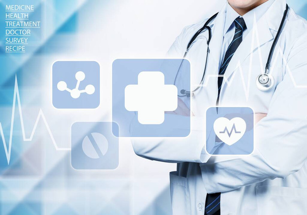 Close-up of male Doctor with stethoscope write digital icons   - Photo, image