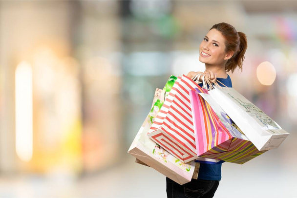 Young woman with shopping bags  - Foto, Imagen