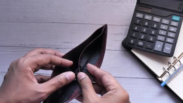 Man hand holding empty wallet, close up  - Záběry, video