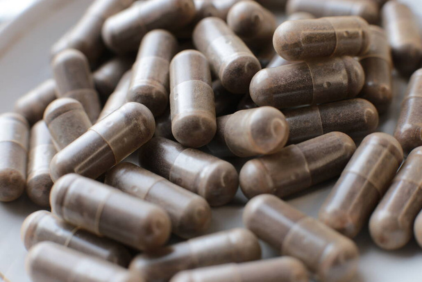 Mode medische macro foto achtergrond pillen en capsules - Foto, afbeelding