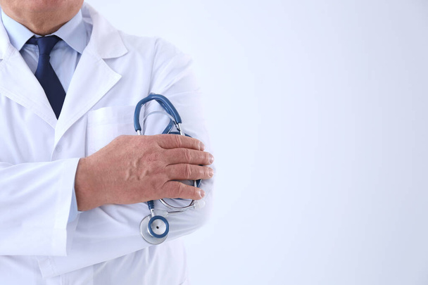 Senior doctor with stethoscope on white background, closeup - Фото, изображение