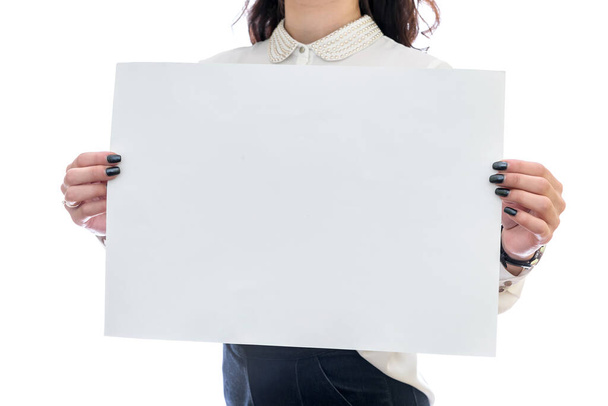 Woman with empty sheet of paper isolated on white - Photo, Image