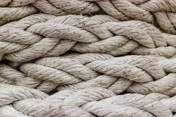 Old fashioned harbor marina sail boat ropes. Yachting details and objects concept. - Zdjęcie, obraz