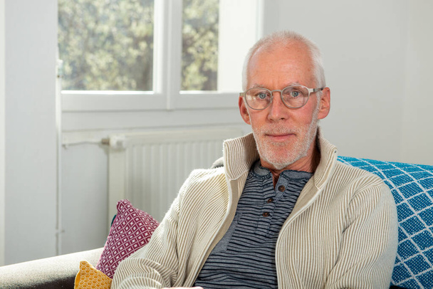 portrait of senior with white hairs wearing eyeglasses - Foto, Imagem
