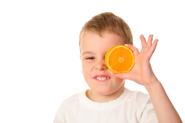 Child with orange - Foto, Bild