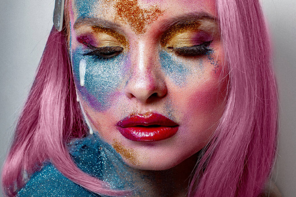 Beautiful female portrait with color glitter - Fotoğraf, Görsel