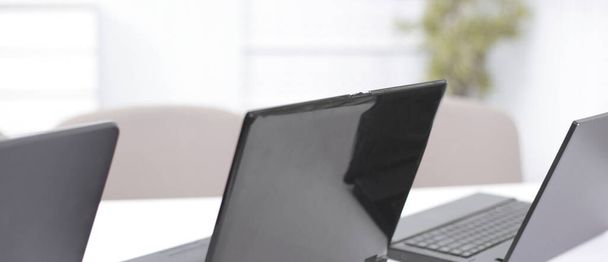 open the laptop on the desktop in a modern office - Фото, изображение