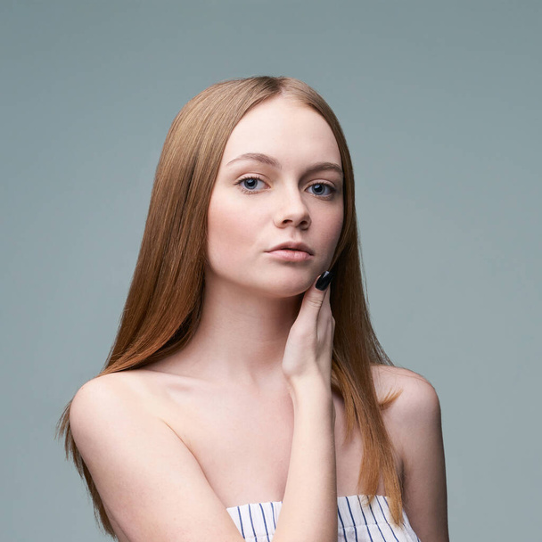 Young pretty woman studio portrait. Cosmetology concept - Photo, Image