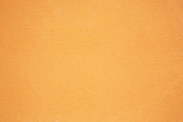 Oranje kleur cement textuur muur, Stucwerk muur, Beton achtergrond, steen ruwe oppervlak, Voor interieur en exterieur gebouw concept - Foto, afbeelding