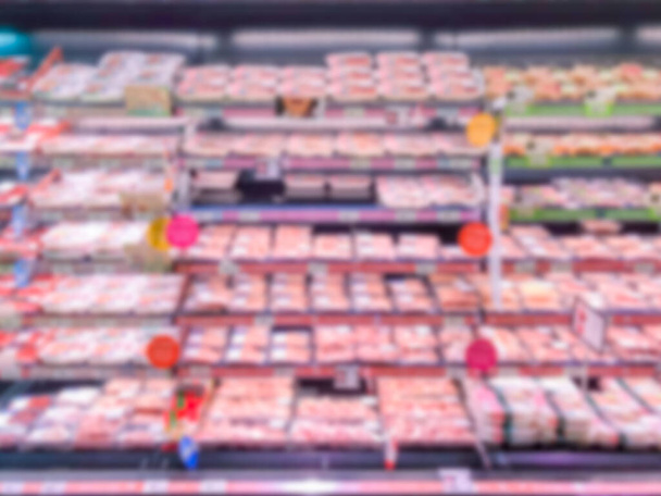 Abstrakti hämärtynyt moderni vähittäiskaupan supermarket käytävällä hyllyt jäähdytetty vyöhyke
 - Valokuva, kuva