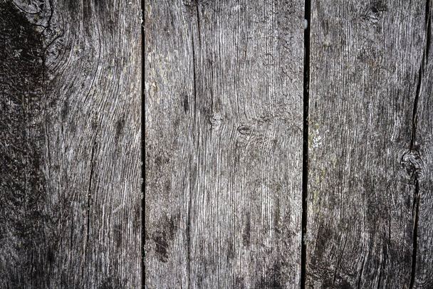 Old gray cracked natural wood texture. Wooden wall background - 写真・画像