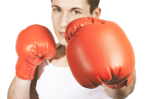 Young man with boxing glove. - Foto, Bild