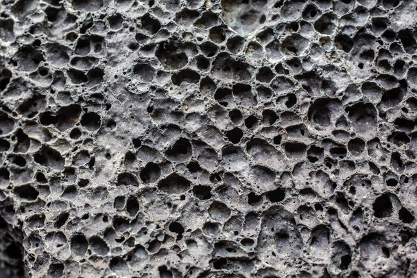 pedra-pomes porosa cinzenta como uma rocha ígnea vulcânica
 - Foto, Imagem