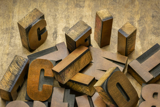 closeup of vintage letterpress wood type printing blocks - craftsmanship concept - Foto, Bild