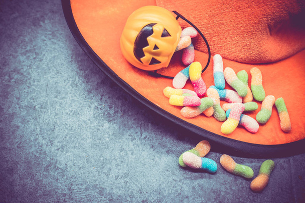 Halloween pumpkin, trick or treat concept with sweet candies - Zdjęcie, obraz