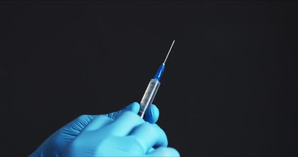 Doctor preparing vaccine for injection - Footage, Video
