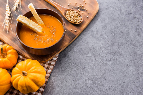 pumpkin soup for Halloween and Thanksgiving party. Harvest and fall autumn season. - Photo, image