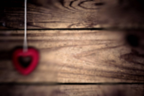 close-up shot of heart shape on wooden tabletop, Valentines day concept - Photo, Image
