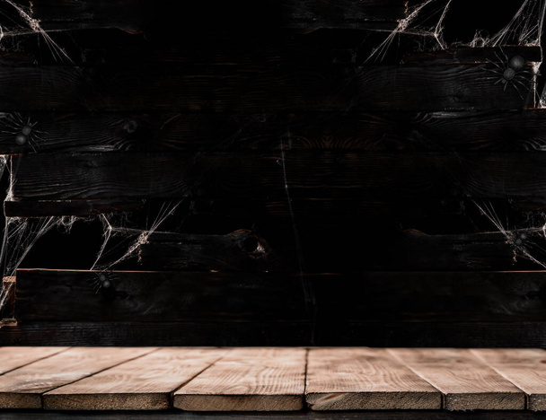Halloween background and wallpaper. Dark wooden texture and empty space for text - Фото, зображення