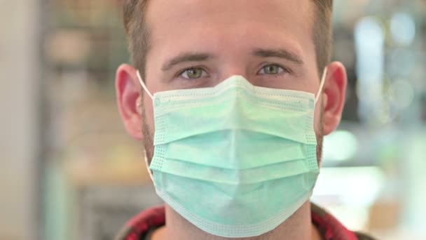 Close up of Young Man with Protective Face Mask  - Filmmaterial, Video