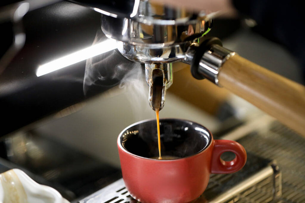detail of espresso machine making coffee  - Photo, Image