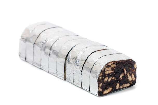Traditional portuguese sweet chocolate salame isolated on a white background. - Photo, Image