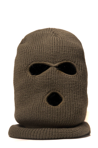 máscara en la cabeza Pasamontañas aislado sobre un fondo blanco
. - Foto, Imagen