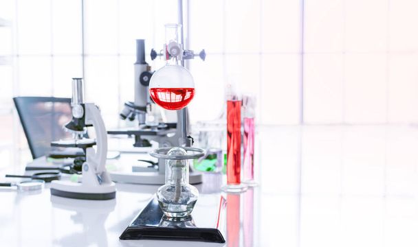 Science test tube and equipment on white top table in science lab, Science testing concept - 写真・画像