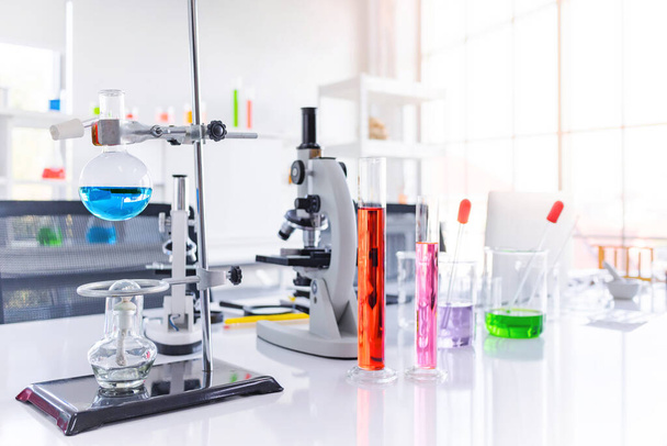 Science test tube and equipment on white top table in science lab, Science testing concept - Foto, imagen