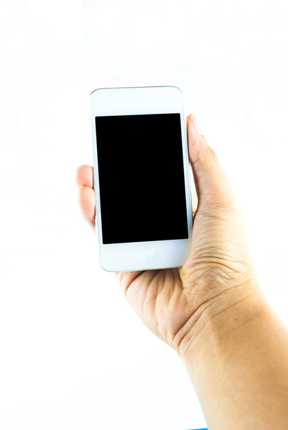 el beyaz zemin üzerine boş bir ekran ile mobil akıllı telefon tutarak - Fotoğraf, Görsel