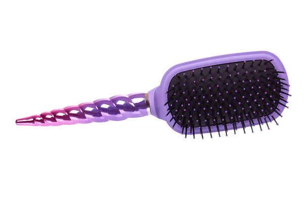 Purple hairbrush, hair care and beauty. Isolated on white background. - Фото, изображение