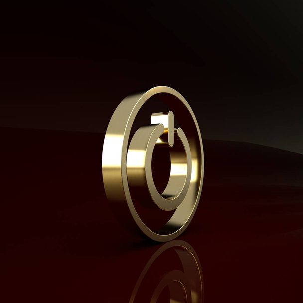 Золотая кнопка питания значок изолирован на коричневом фоне. Начинай. Концепция минимализма. 3D-рендеринг
 - Фото, изображение