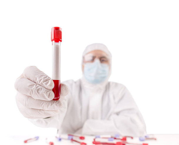 Doctor with blood test tube - Photo, image