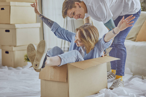 happy Young couple moving in new home - Фото, изображение
