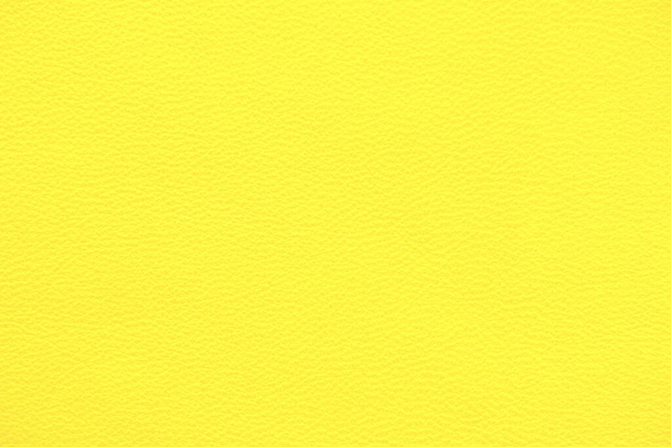Textuur van echte lederen gele kleur closeup. - Foto, afbeelding