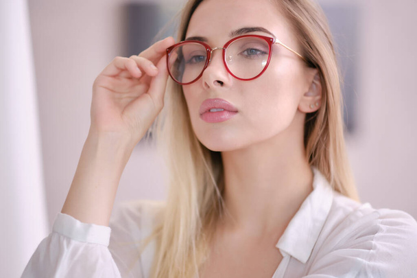 Cute young business woman with glasses - Fotó, kép