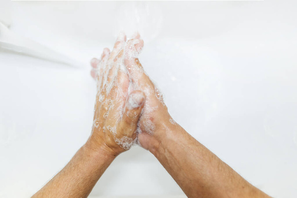 Washing hands rubbing with soap man for corona virus prevention, hygiene to stop spreading coronavirus. - Photo, image
