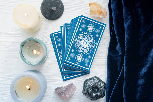 Tarot cards on the white wooden table background. - Foto, Imagem