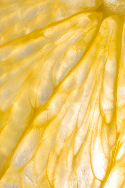 Bright juicy orange pulp close-up. High-quality image is suitable for topics: healthy lifestyle, vitamins, proper nutrition, diet, summer, fresh juices. Background fruit texture. - Φωτογραφία, εικόνα