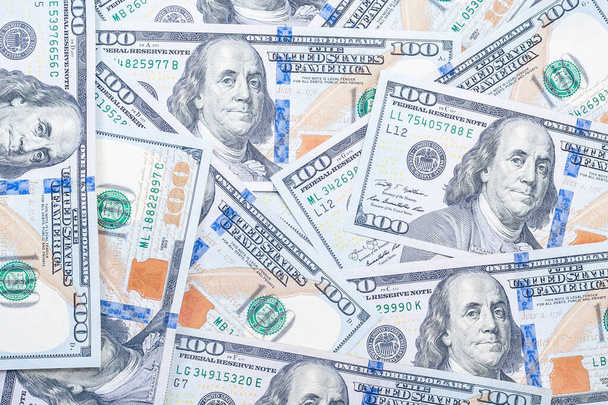 tausta monia uusia 100 Yhdysvaltain dollarin seteleitä muotokuva Yhdysvaltain presidentti Benjamin Franklin
 - Valokuva, kuva