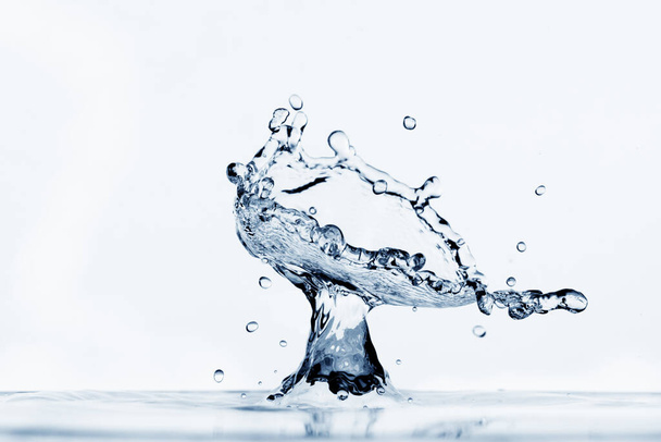 water splash isolated on white background - Φωτογραφία, εικόνα
