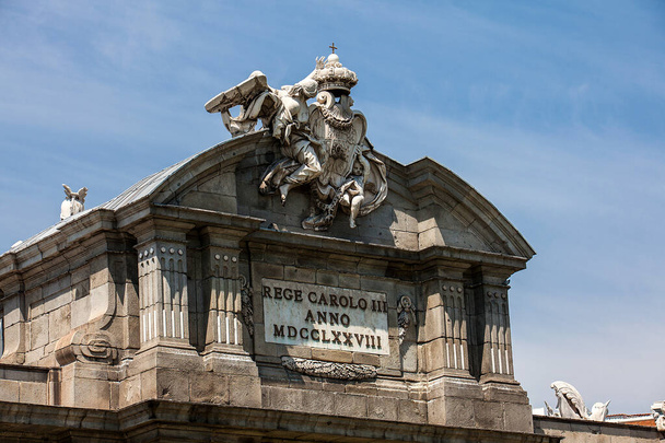 The famous Puerta de Alcala on a beautiful sunny day in Madrid City. Inscription on the pediment: Rey Carlos III year 1778 - Fotó, kép